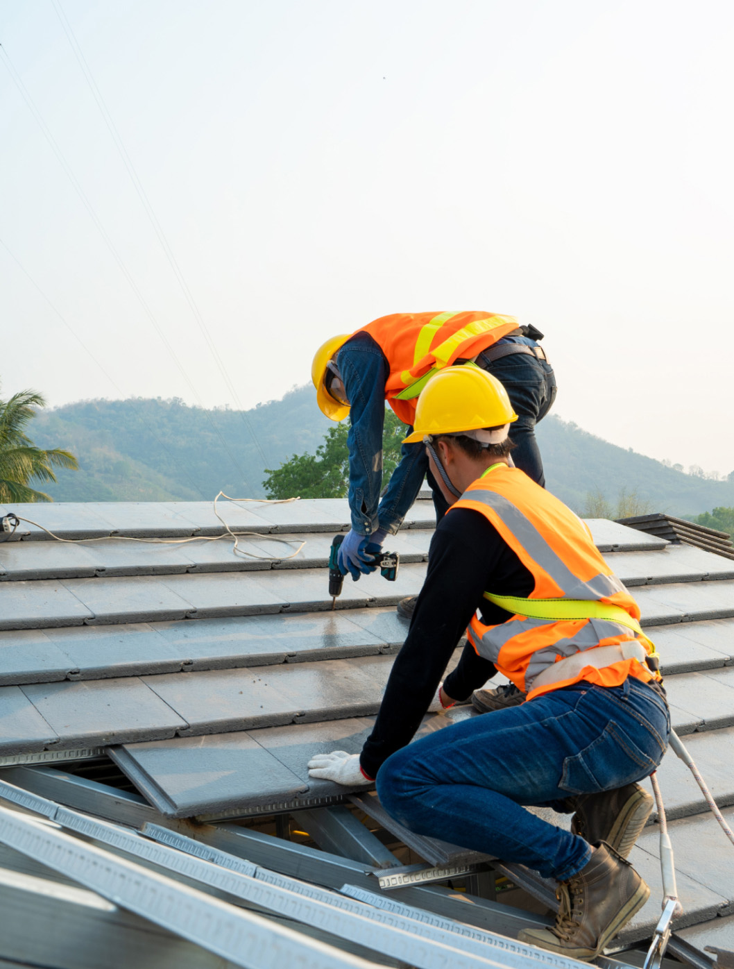 man working on a roof